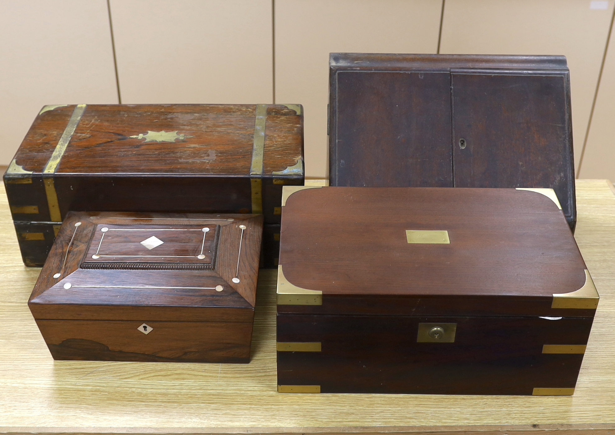 Two 19th century brass mounted writing slopes, a stationery cabinet and a work box